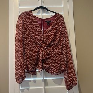 Red peplum tie front blouse